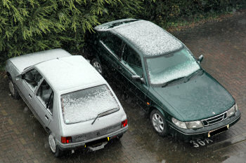 Picture of cars with some snow on them
