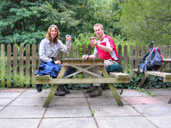Picture of two people sitting at a beer garden table