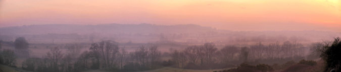 Picture of a panoramic view over wide field in the evening light