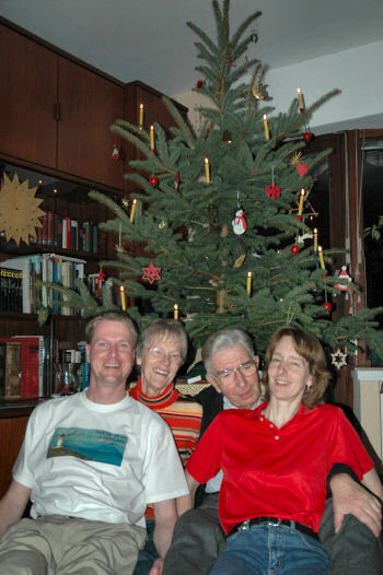 Picture of the Grewe family in front of the Christmas tree