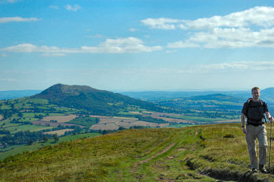 Picture of a walker coming up a hill