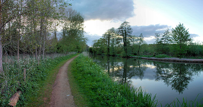 Picture of a panoramic view over a calm canal in the evening light